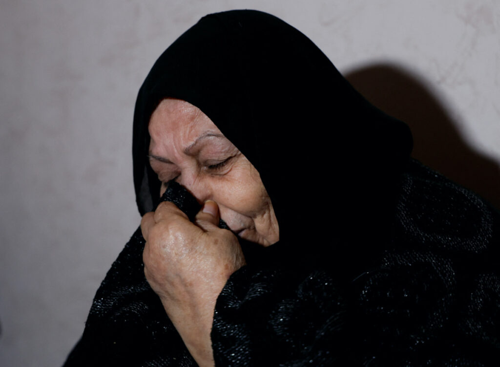 Mother of a Palestinian man, Abdel-Karim Abu Jalhoum, who died with his family in the earthquake in Turkey, mourns at the family house in Beit Lahiya in northern Gaza Strip February 8, 2023. REUTERS/Mohammed Salem