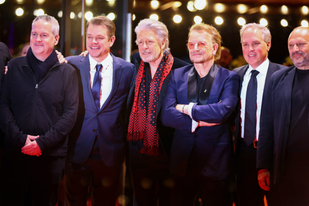 Producer Matt Damon, Adam Clayton and Bono of U2, screenwriter Bill S Carter and Mirsad Purivatra attend the screening of the documentary movie Kiss the Future at the 73rd Berlinale International Film Festival in Berlin, Germany, February 19, 2023.