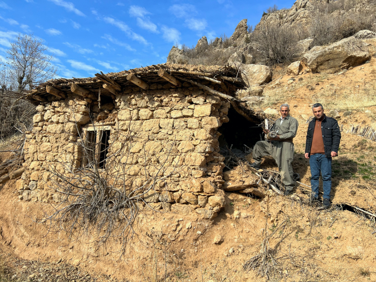 Sararo villagers show the damage, they say, was caused by Turkish bombardment on their village, in Dohuk, Iraq, December 27, 2022. REUTERS/Amina Ismail