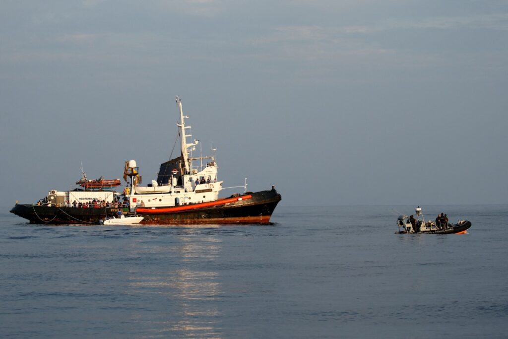 A rigid-hulled inflatable boat (RHIB) of the Italian Finance Police patrols near the Mare Jonio, operated by Italian charity Mediterranea Saving Humans, and the German NGO Sea-Eye migrant rescue ship 'Alan Kurdi' - unseen - in international waters of the Italian island of Lampedusa in the central Mediterranean Sea, August 31, 2019.