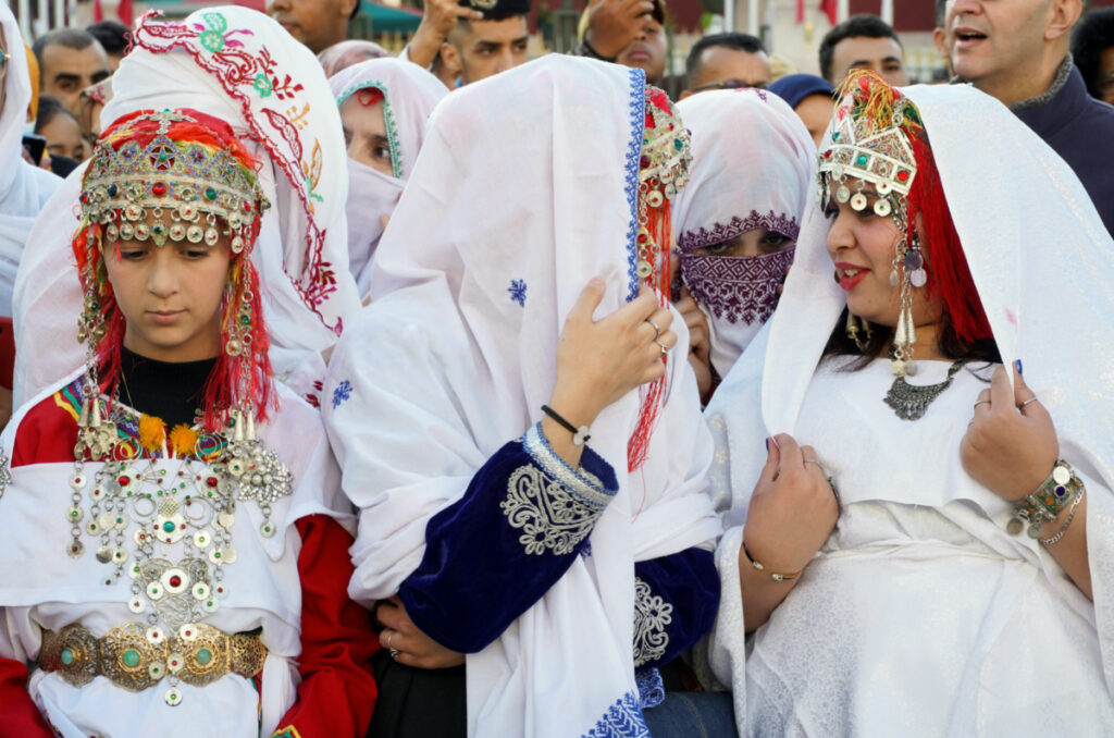 Amazigh people wear traditional clothes as they celebrate their new year outside the parliament, with calls on the government to recognize the day and put more effort into supporting their language in Rabat, Morocco January 13, 2023. REUTERS/Abdelhak Balhaki