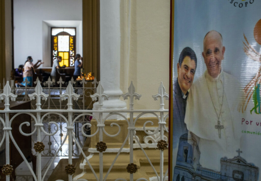 A poster featuring Bishop Rolando Alvarez and Pope Francis hangs inside the Cathedral in Matagalpa, Nicaragua, Aug 19, 2022.