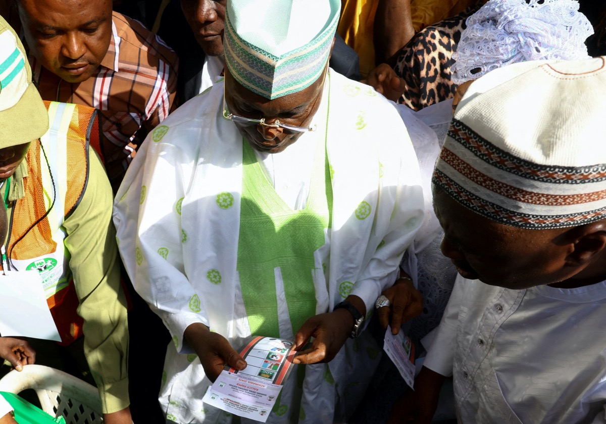 Atiku Abubakar of the People's Democratic Party, the main opposition candidate in Nigeria's presidential election, casts his ballot in Yola, Nigeria, February 21, 2023. 