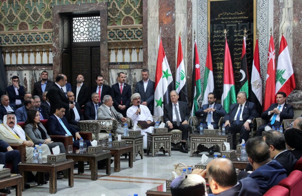 Syrian parliament members and Parliamentary Speaker Hammouda Sabbagh meet with a delegation from the Arab Inter-Parliamentary Union in Damascus, Syria February 26, 2023. REUTERS/Firas Makdesi