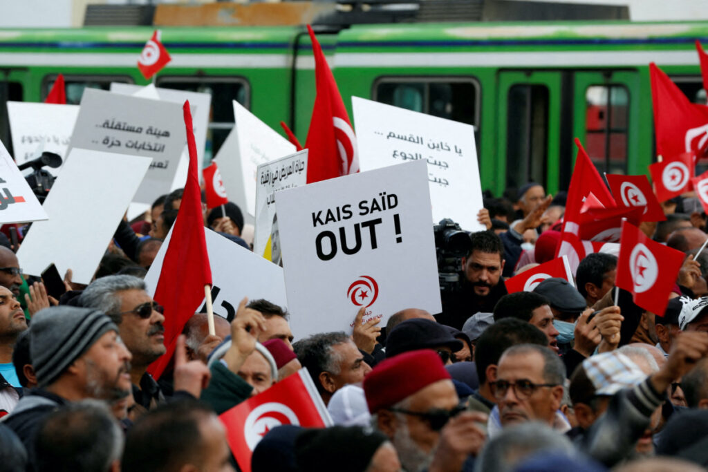 FILE PHOTO: Demonstrators attend a protest against Tunisian President Kais Saied, on the anniversary of the 2011 uprising, in Tunis, Tunisia January 14, 2023. REUTERS/Zoubeir Souissi/File Photo