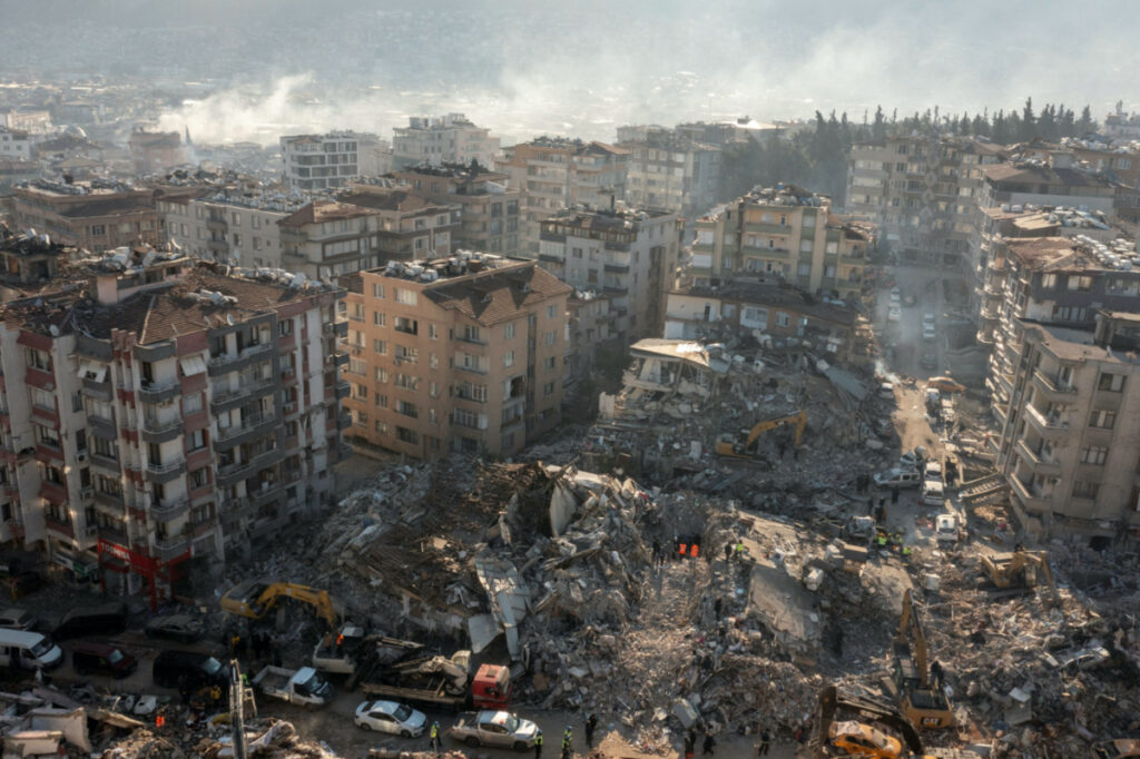 An aerial view shows collapsed and damaged buildings following an earthquake in Hatay, Turkey February 10, 2023.