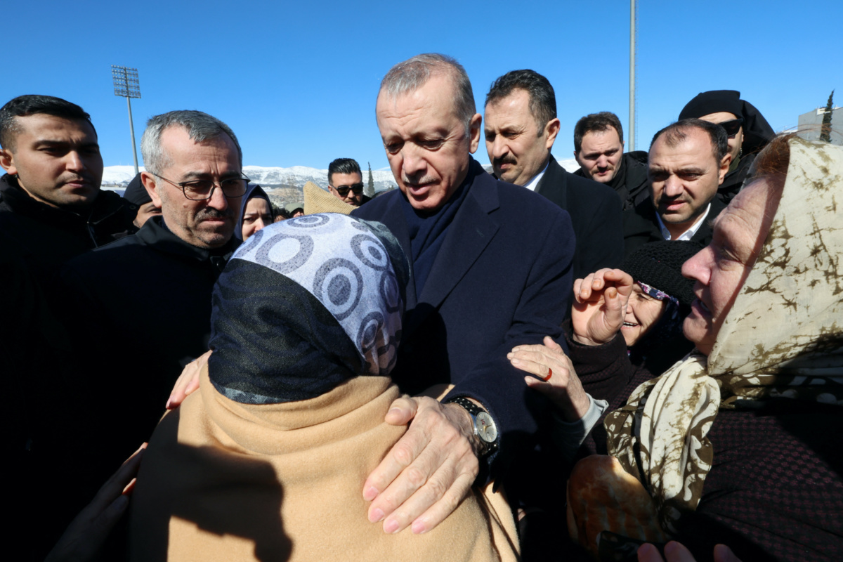 Turkish President Tayyip Erdogan meets with people in the aftermath of a deadly earthquake in Kahramanmaras, Turkey February 8, 2023.