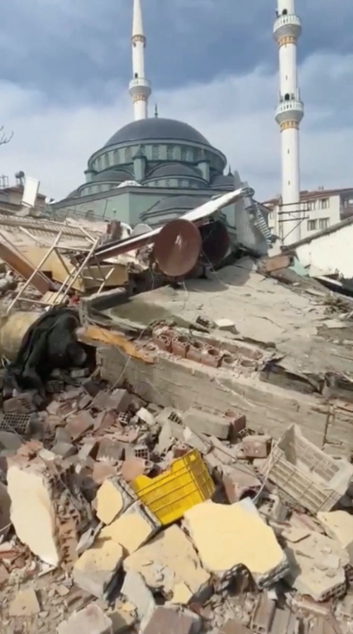 Rubble from buildings that collapsed due to the 5.6 magnitude earthquake is shown in this video screengrab obtained from social media, in Malatya, Turkey, February 27, 2023. Haytap/via REUTERS