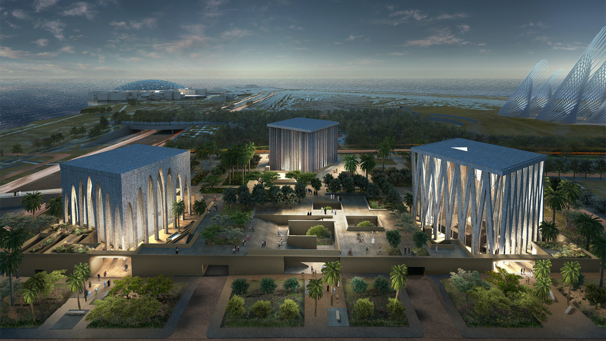 An aerial night view rendering of the Abrahamic Family House, including a mosque, from left, church and synagogue, on Saadiyat Island in Abu Dhabi. Image courtesy of Adjaye Associates