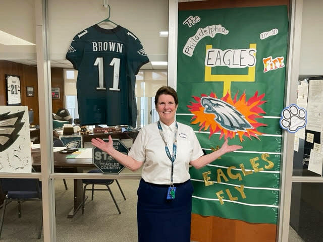 Sister Margaret decorated to show off her Eagles support including doorways, jerseys, tickets, personal photos and other paraphanelia around the office.
