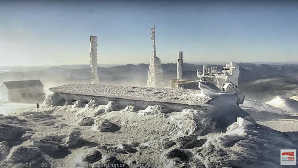 A view from the top of the observatory tower at Mount Washington State Park, where the wind chill dropped to 105 degrees below zero Fahrenheit (-79 Celsius) is seen in a still image from a live camera in New Hampshire, U.S. February 4, 2023. Mount Washington Observatory/mountwashington.org/Handout via REUTERS