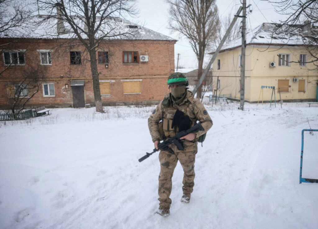 A Ukrainian serviceman walks on an empty street, as Russia's attack on Ukraine continues, in the front line city of Bakhmut, Ukraine February 17, 2023.