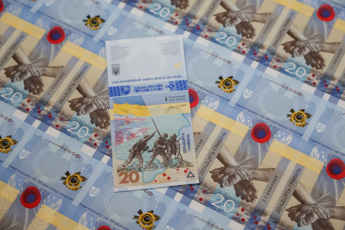 Banknotes dedicated to the first anniversary of Russia's invasion on Ukraine are seen during a presentation at the Ukrainian National Bank in Kyiv, Ukraine February 23, 2023.