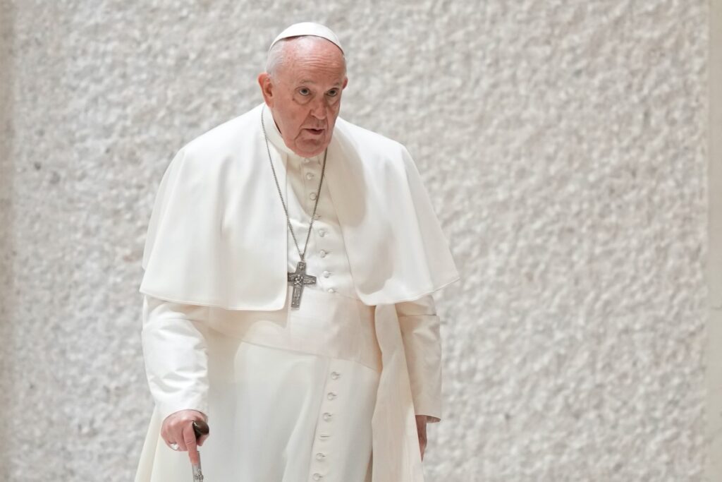 Pope Francis arrives for an audience with members of Roman Universities and Pontifical Institutions, in the Pope Paul VI hall at the Vatican, Saturday, Feb. 25, 2023.