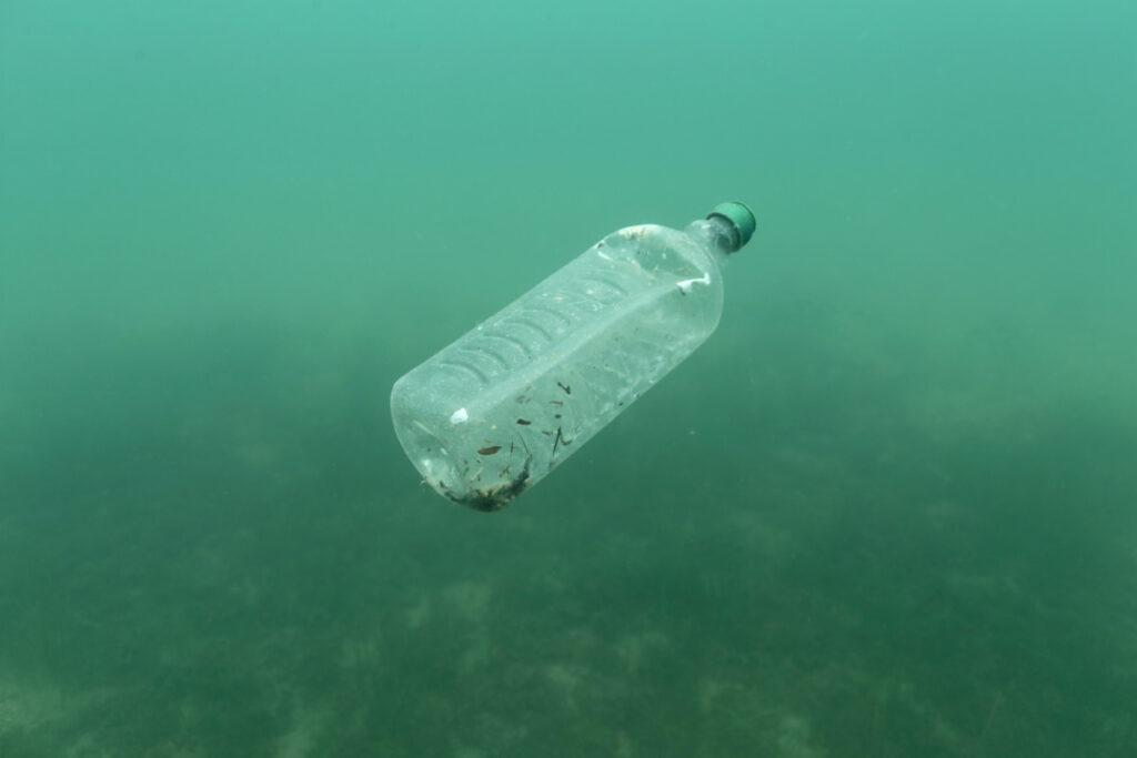 FILE PHOTO: A plastic bottle is seen floating in an Adriatic sea of the island Mljet, Croatia, May 30, 2018. Picture taken May 30, 2018. REUTERS/Antonio Bronic