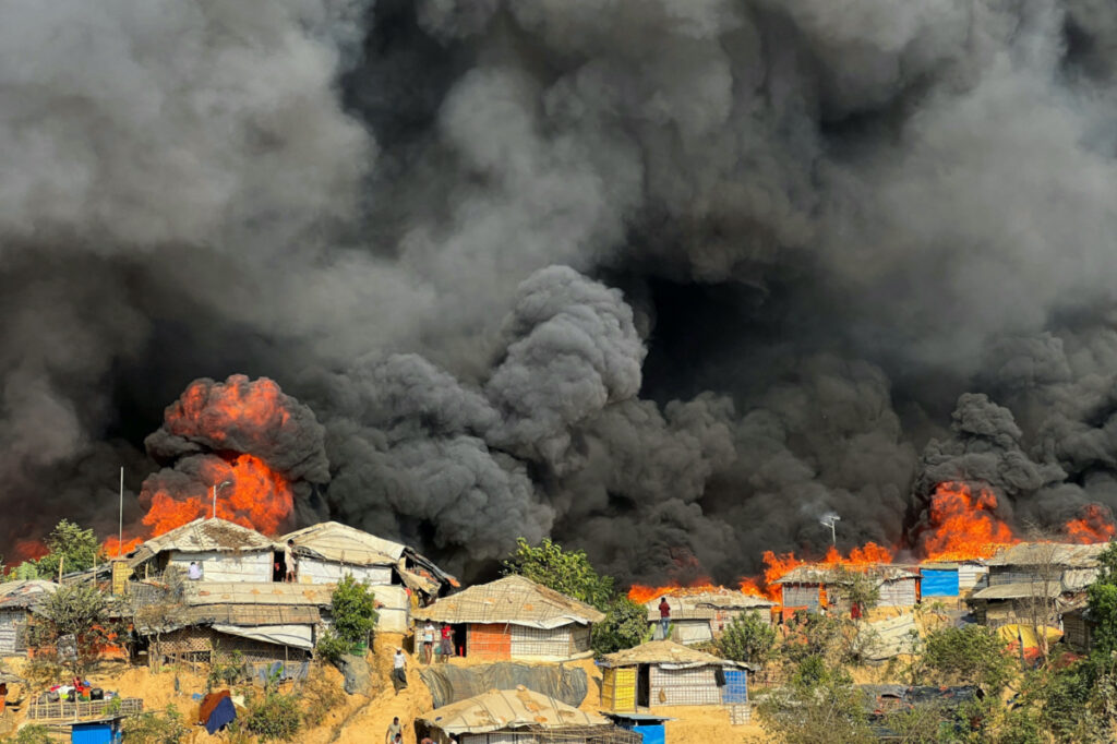 Fire burns in the Rohingya refugee camp in Balukhali in Cox's Bazar, Bangladesh, March 5, 2023. REUTERS/Ro Yassin Abdumonab