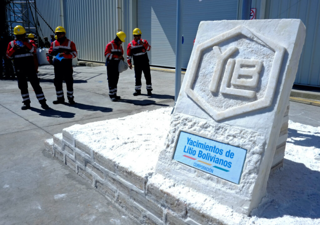 FILE PHOTO: A sign made with salt blocks with the logo of state-owned Yacimientos de Litio Bolivianos (YLB), also known as Bolivian Lithium Deposits, is seen at the plant of Llipi in Uyuni, Bolivia, October 7, 2018. Picture taken October 7, 2018. REUTERS/David Mercado