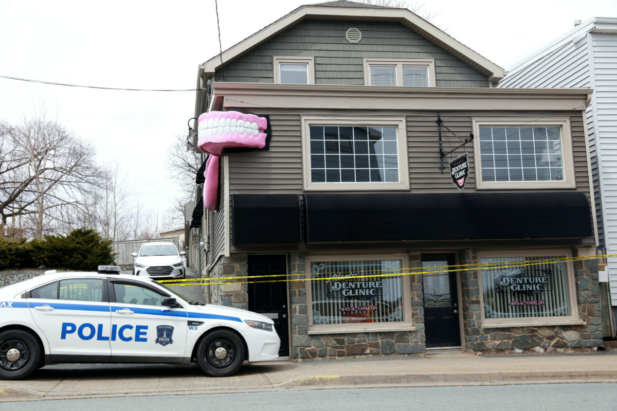FILE PHOTO: A Halifax Police Cruiser monitors the Atlantic Denture Clinic, where the gunman responsible for a mass shooting Gabriel Wortman worked, in Dartmouth, Nova Scotia, Canada April 20, 2020. REUTERS/John Morris