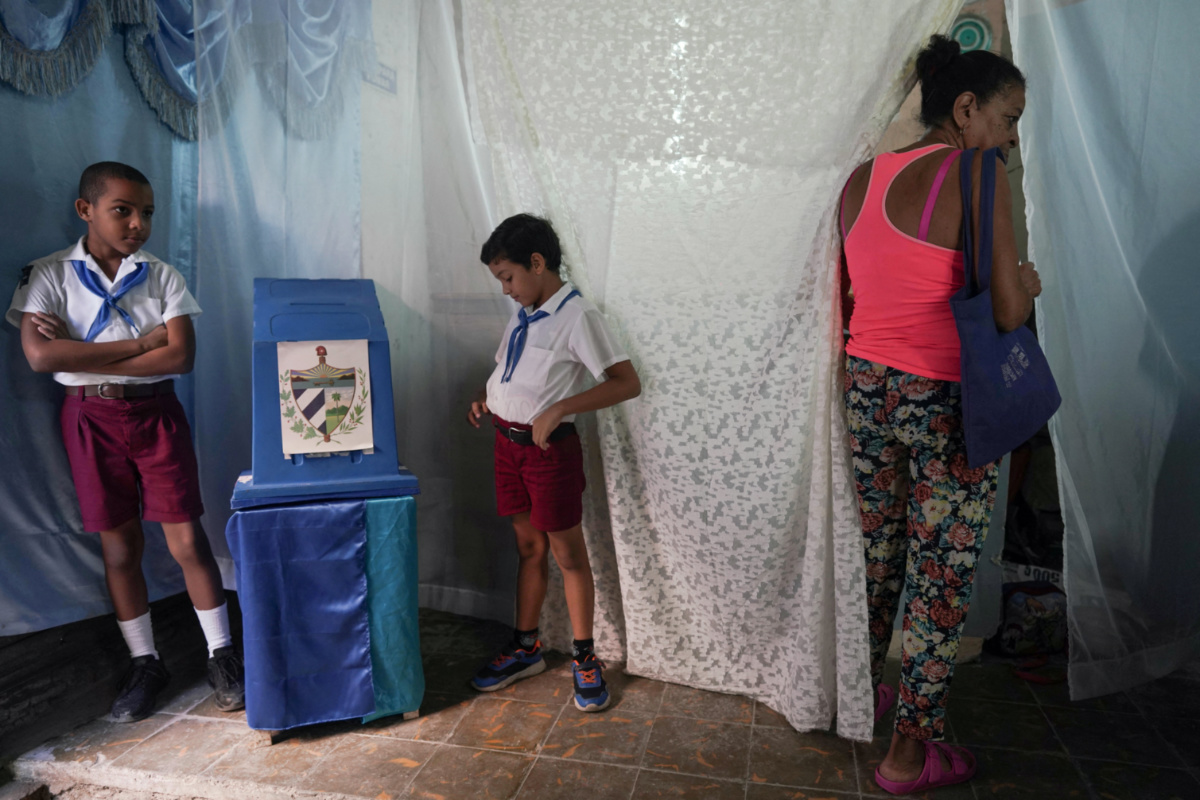 A woman prepares her vote at a polling station during the legislative elections in Havana, Cuba, on 26th March, 2023. 