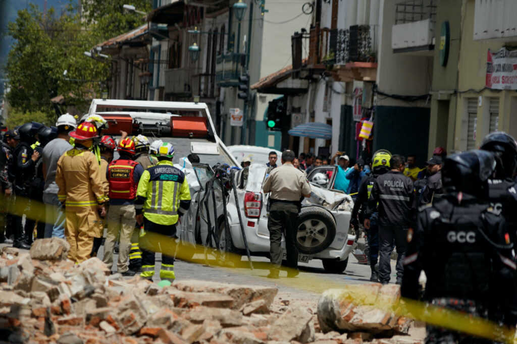 A damaged car and rubble from a house affected by the earthquake are pictured in Cuenca, Ecuador, on 18th March, 2023.