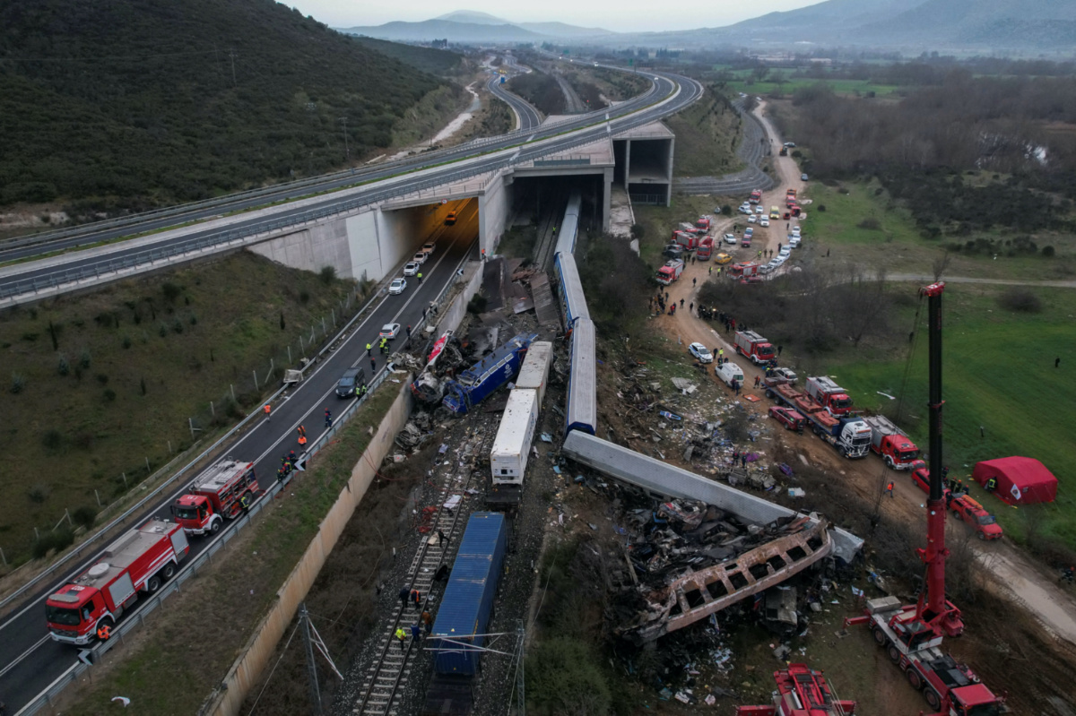 Rescue crews operate at the site of a crash, where two trains collided, near the city of Larissa, Greece, March 1, 2023. 