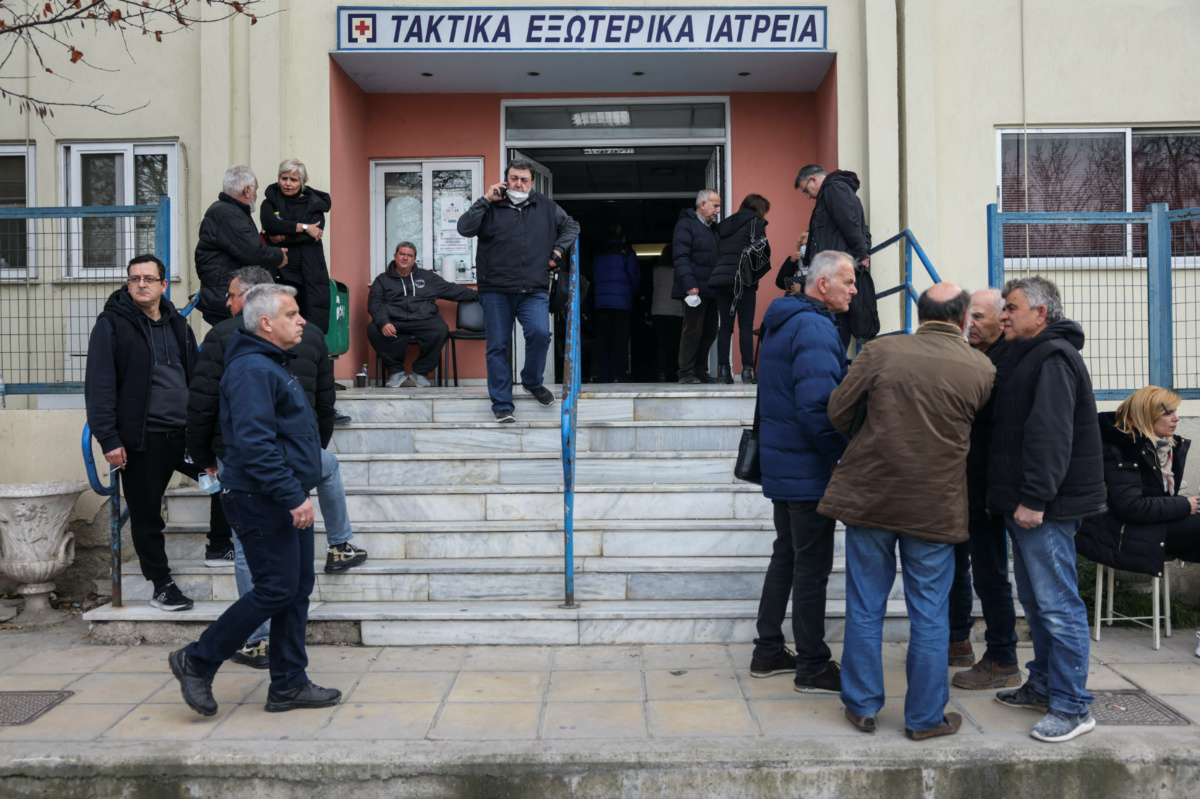Relatives and friends wait for news on people who are missing after two trains collided near the city of Larissa, outside a hospital in Larissa, Greece, March 1, 2023. REUTERS/Alexandros Avramidis