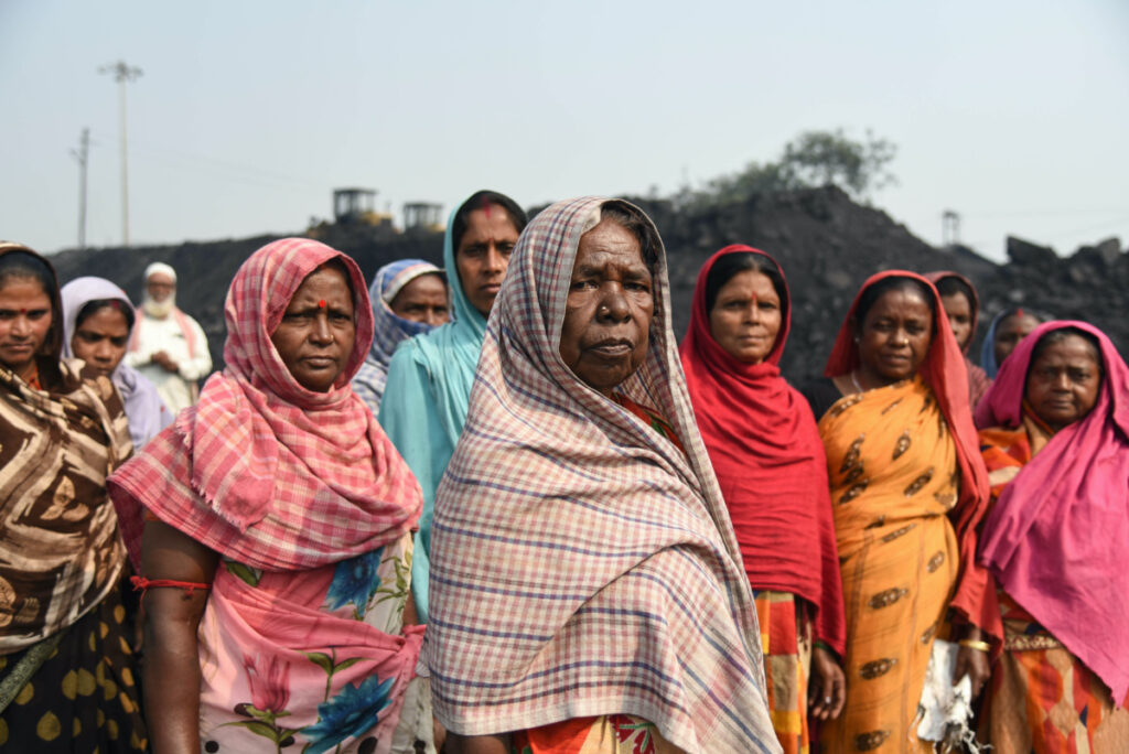 Women coal loaders pose for a picture in Jharia coalfield, India, on 10th November, 2022.