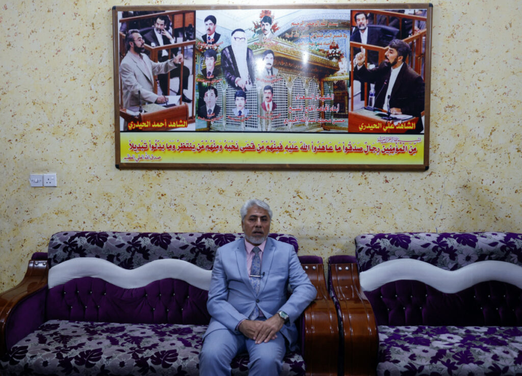 Ali Hassan al-Haidari, who testified against former Iraqi President Saddam Hussein during the Dujail trial, that led to Saddam's death sentence, sits at his home in Dujail, Iraq, January 28, 2023.
