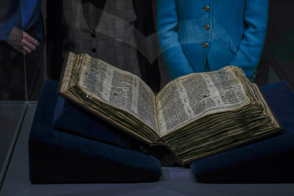 The Codex Sassoon 1,100-year-old Hebrew Bible is on display at the Tel Aviv's ANU Museum of the Jewish People for a week-long exhibition of the manuscript, part of a whirlwind worldwide tour of the artifact in the United Kingdom, Israel and the United States before its expected sale, Israel, Wednesday, March 22, 2023. One of the oldest surviving biblical manuscripts is up for sale — for a cool $30 million. The Codex Sassoon is a nearly complete 1,100-year-old Hebrew Bible. Sotheby's is putting it up for auction in New York in May for an estimated price of $30 million to $50 million. (AP Photo/Ariel Schali
