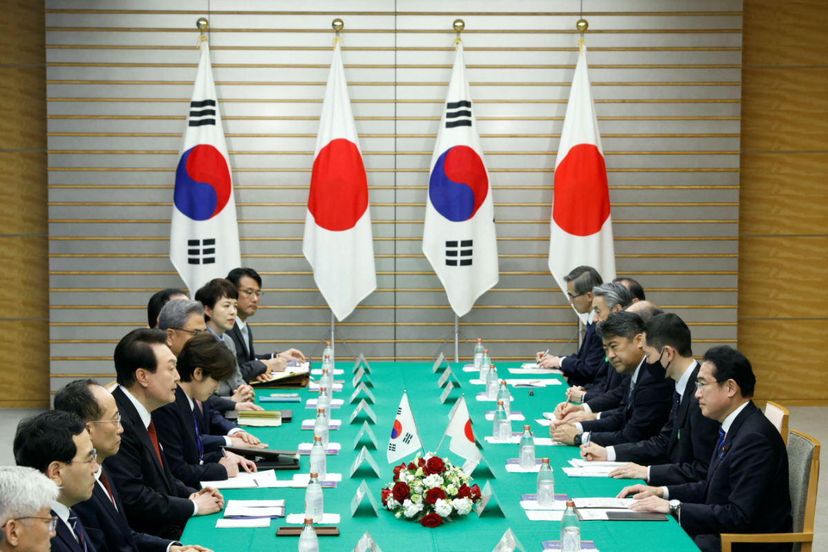 Japan's Prime Minister Fumio Kishida and South Korea's President Yoon Suk Yeol attend a meeting at the prime minister's official residence in Tokyo, Japan, March 16, 2023. Kiyoshi Ota/Pool via REUTERS