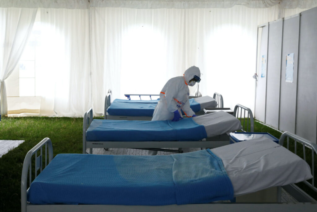 A nurse is seen inside a screening and isolation field hospital set to fight against the spread of the coronavirus disease at a soccer stadium in the town of Machakos, in Machakos county, Kenya, April 22, 2020. picture taken April 22, 2020.