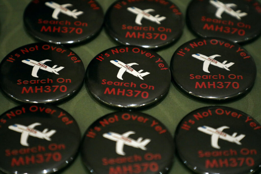 Badges are displayed during the sixth annual remembrance event for the missing Malaysia Airlines flight MH370 in Putrajaya, Malaysia, March 7, 2020.