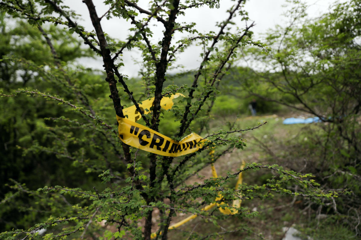 Yellow police tape is seen at the Barranca del Carnicero where the remains of Christian Alfonso Rodriguez Telumbre, one of the 43 missing students from Ayotzinapa Rural Teachers' College, were found, at the mountain town of Cocula, near Iguala in the southwestern state of Guerrero, Mexico July 8, 2020. 