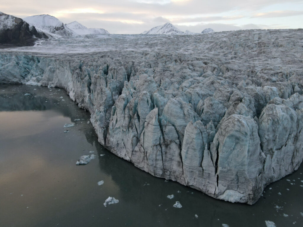 FILE PHOTO: A view of the Esmarkbreen glacier on Spitsbergen island, part of the Svalbard archipelago in northern Norway, September 24, 2020. Picture taken with a drone on September 24, 2020. REUTERS/Natalie Thomas