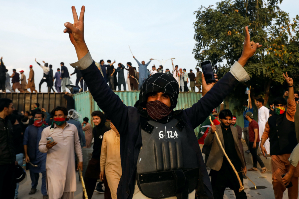 A supporter of former Pakistani Prime Minister Imran Khan gestures during a clash outside Federal Judicial Complex in Islamabad, Pakistan March 18, 2023. REUTERS/Akhtar Soomro