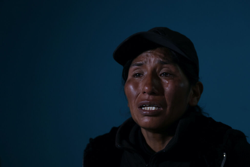Asunta Jumpiri, 38, mother of 15-years-old son Brayan Apaza Jumpiri, one of the victims killed during latest protests against Peru's President Dina Boluarte, reacts during an interview at his son's bedroom in Juliaca, in Puno region, Peru February 7, 2023.