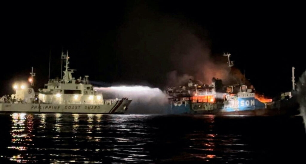 Philippine Coast Guard respond to the fire incident onboard MV Lady Mary Joy 3 at the waters off Baluk-Baluk Island, Hadji Muhtamad, Basilan, Philippines, on 29th March 2023.