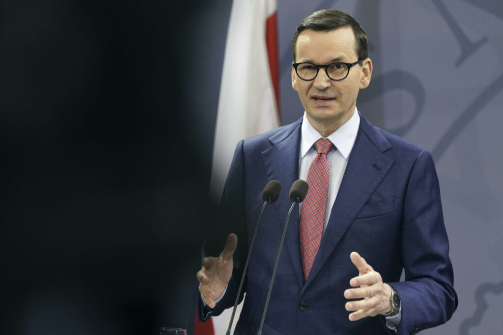 Poland's Prime Minister Mateusz Morawiecki speaks as he take parts in a joint press conference with Denmark's Prime Minister Mette Frederiksen, after a meeting in the Prime Minister's Office, in Copenhagen, Denmark, Thursday Feb. 23, 2023. (Liselotte Sabroe/Ritzau Scanpix via AP)