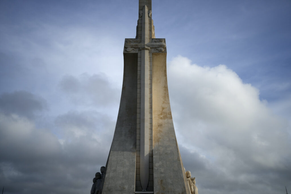 The sword of the Royal House of Avis on a stylised cross decorates the 56-meter high Monument to the Discoveries by the Tagus River in Lisbon, on Thursday, 30th March, 2023.