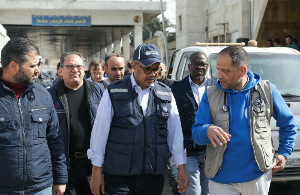 Director-General of the World Health Organization Tedros Adhanom Ghebreyesus walks at a hospital supported by Syrian American Medical Society (SAMS), in the aftermath of the deadly earthquake, in Bab al-Hawa crossing at the Syrian-Turkish border, in Idlib governorate, Syria March 1, 2023. REUTERS/Khalil Ashawi
