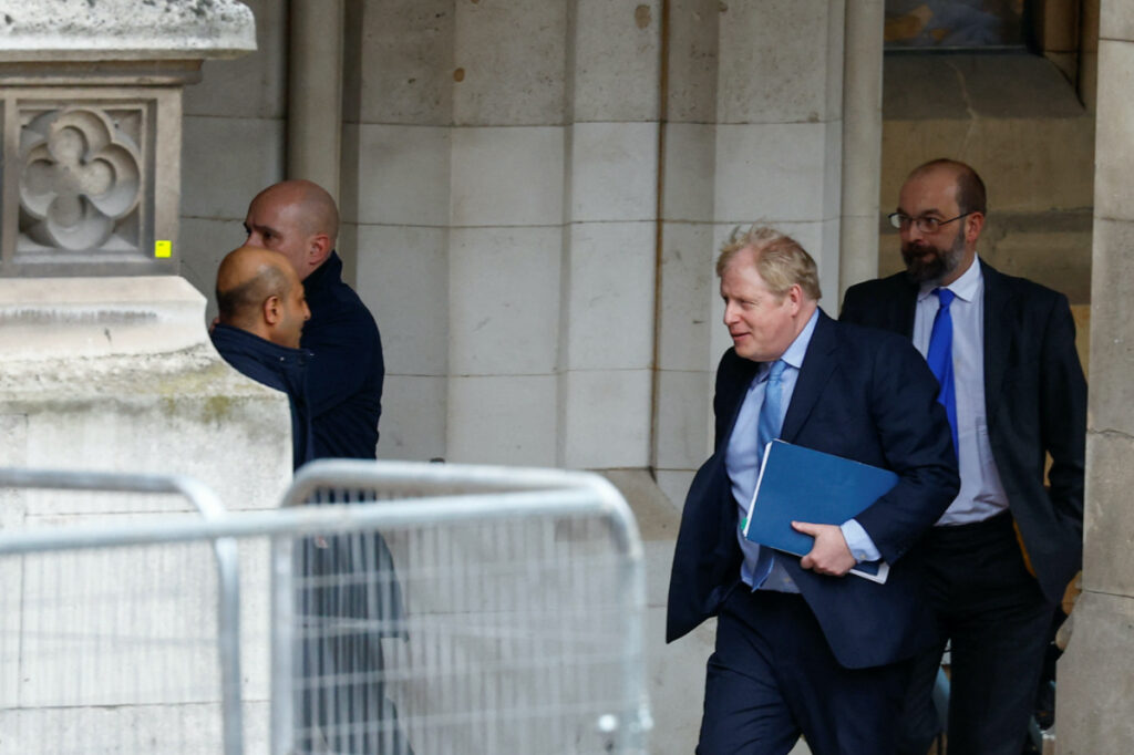 Former British Prime Minister Boris Johnson walks at the parliament in London, Britain, on 22nd March, 2023.