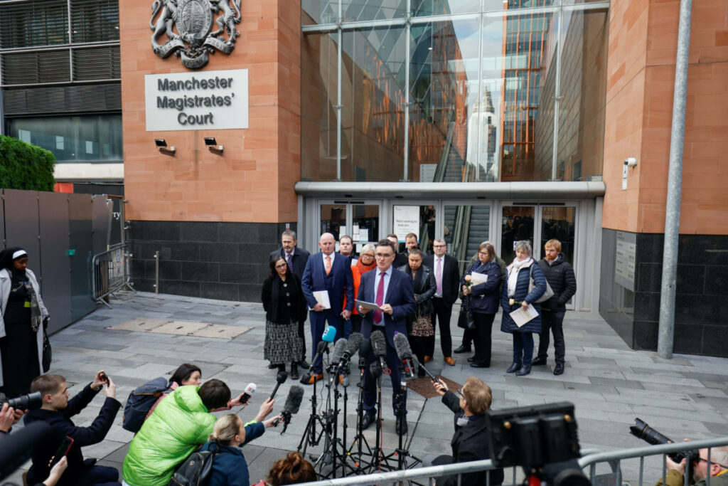 Richard Scorer, principal lawyer of law firm Slater and Gordon, reads out a statement representing 11 victims' families, outside Manchester Magistrates' Court, on the day the Manchester Arena Inquiry report is released, in Manchester, Britain, March 2, 2023. REUTERS/Jason Cairnduff