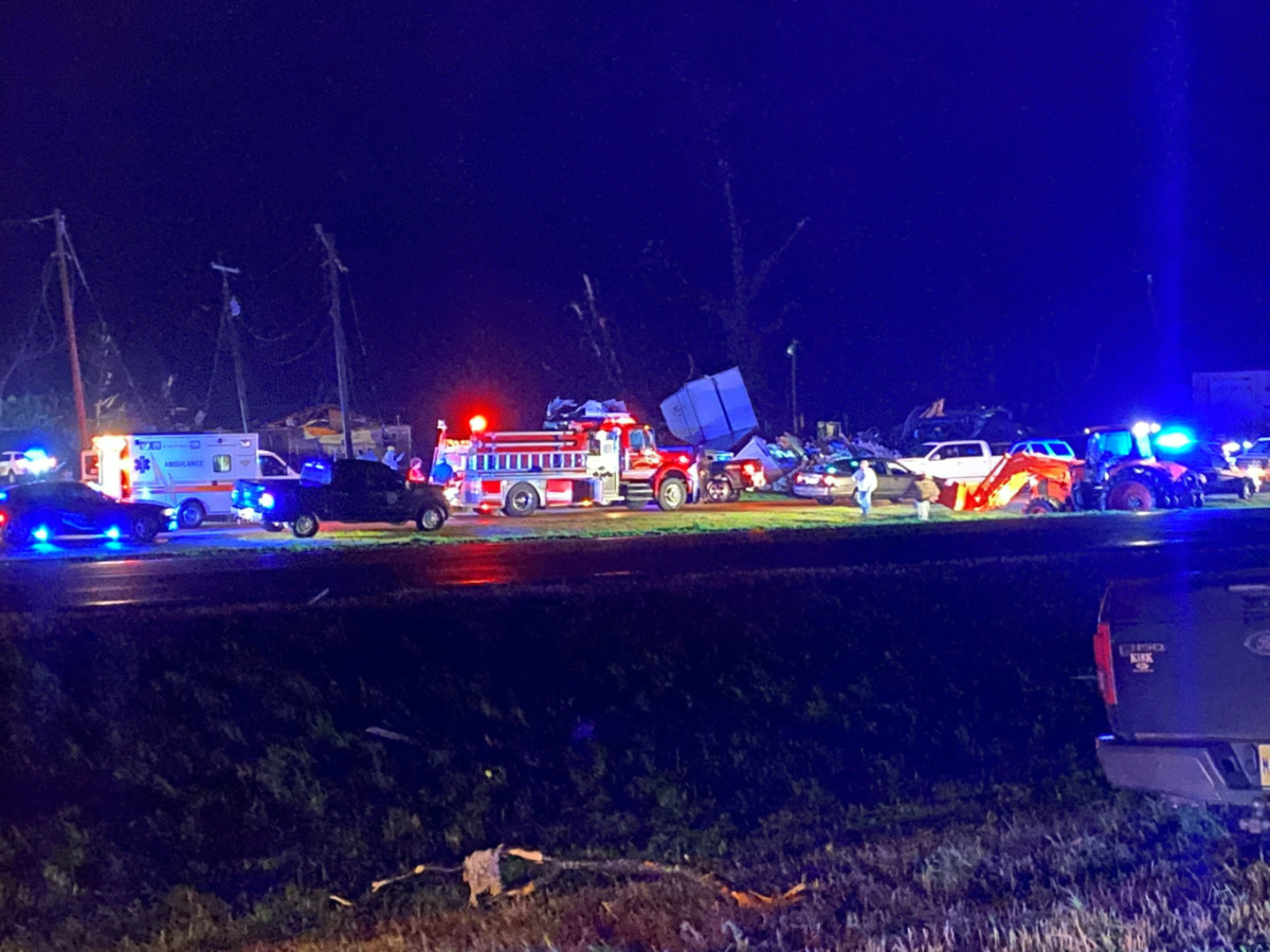 A general view shows damaged cars and structures, while emergency crews work at the scene, following a tornado in Silver City, Mississippi, US, on 24th March, 2023
