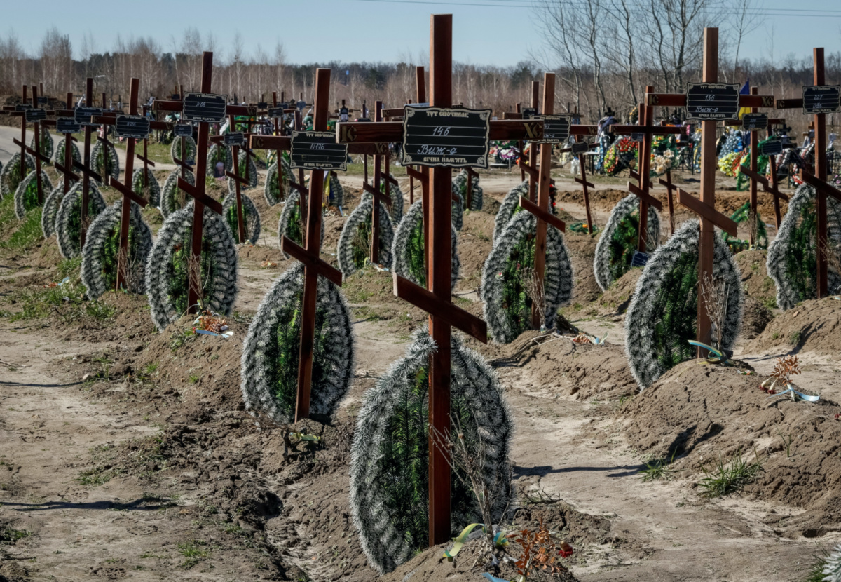 Graves of unidentified people killed by Russian soldiers during occupation of the Bucha town, are seen at the town's cemetery before the first anniversary of its liberation, amid Russia's attack on Ukraine, in the town of Bucha, outside Kyiv, Ukraine, on 30th March, 2023. 
