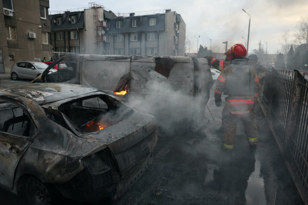A view of emergency workers at the site of a Russian missile strike, amid Russia’s attack on Ukraine, in Kyiv, Ukraine March 9, 2023.