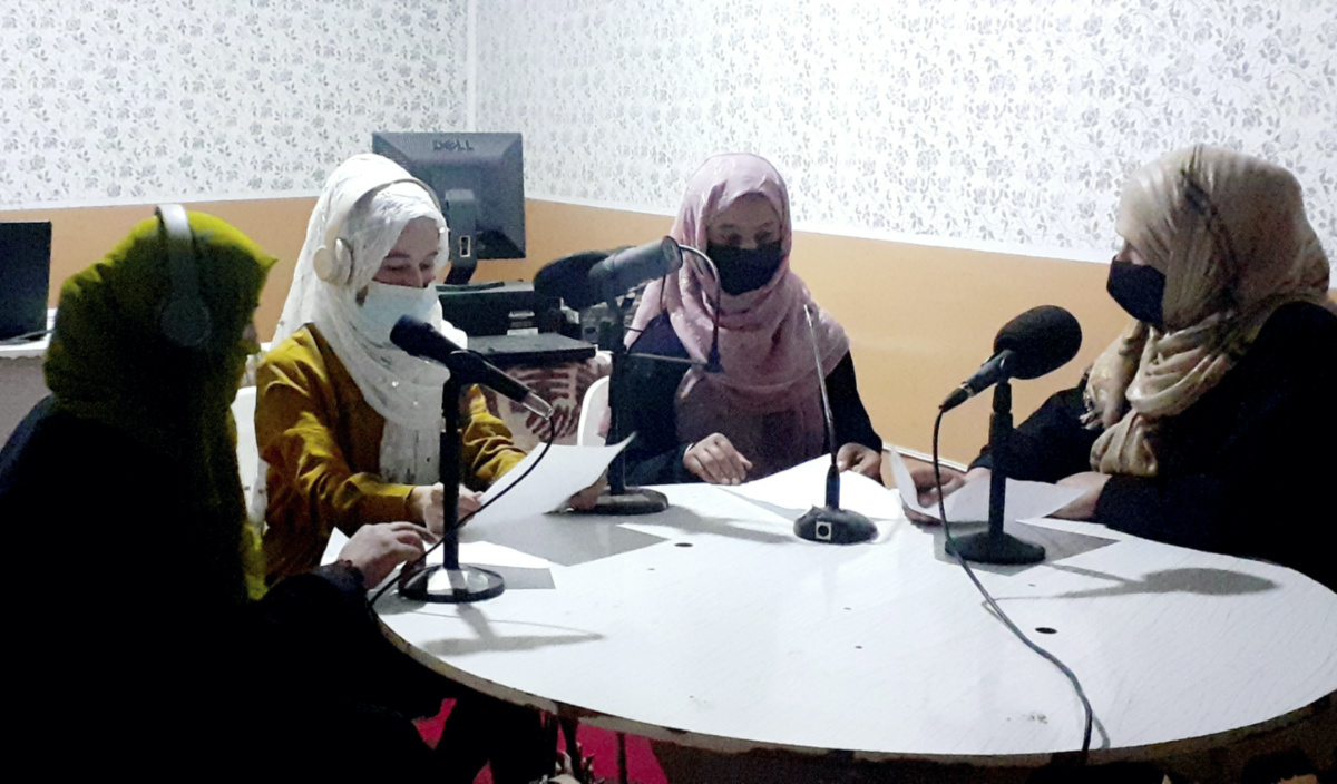 Najia Sorosh head of Sadai Banowan a women-run radio station, right, speaks with her staff in the broadcasting studio in Badakhshan province, north-eastern of Afghanistan, Tuesday, Mar. 7, 2023. A women-run radio station in Afghanistan's northeast has been shut down for playing music during the holy month of Ramadan, a Taliban official said Saturday