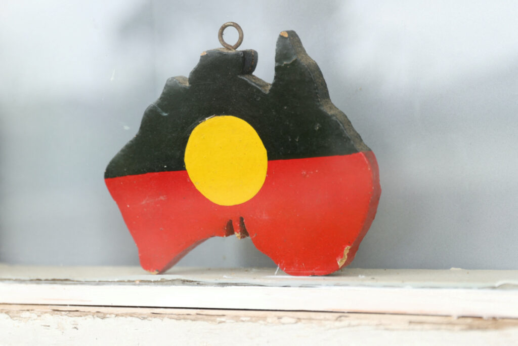 A depiction of the Australian Aboriginal Flag is seen on a window sill at the home of indigenous Muruwari elder Rita Wright, a member of the "Stolen Generations", in Sydney, Australia, on 19th January, 2021.