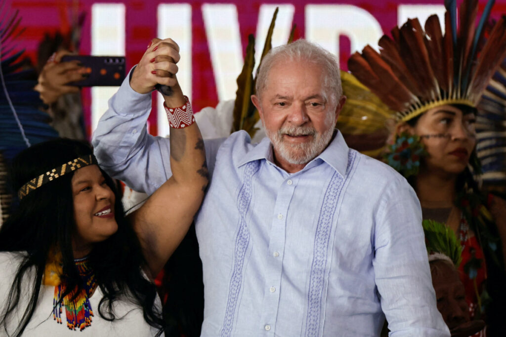 Brazil President Luiz Inacio Lula da Silva gestures along Brazil's Indigenous Peoples Minister Sonia Guajajara, during the closing of the Terra Livre camp, a protest camp to demand the demarcation of land and to defend cultural rights, in Brasilia, Brazil, on 28th April, 2023.