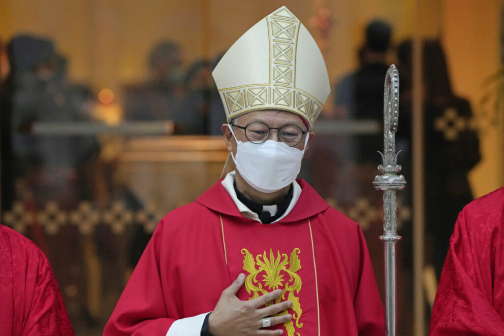Stephen Chow wearing a surgical mask to protect against the coronavirus, poses after the episcopal ordination ceremony as the new Bishop of the Catholic Diocese, in Hong Kong, on 4th December, 2021.