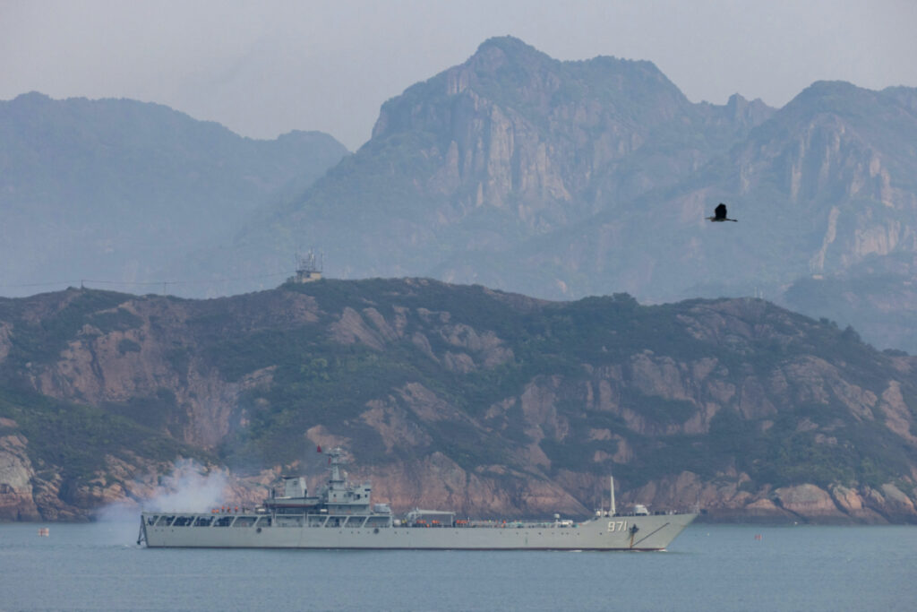 A Chinese warship fires during a military drill off the Chinese coast near Fuzhou, Fujian Province, across from the Taiwan-controlled Matsu Islands, China, on 11th April, 2023.